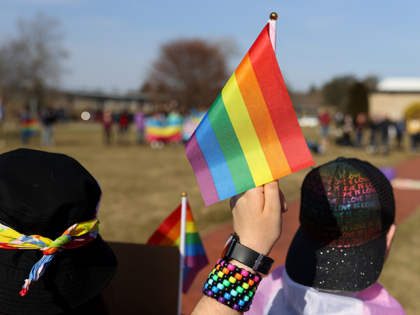 Students at the Norfolk County Agricultural High School participated in a Gay Student Alliance protest/rally in Walpole, MA on March 11, 2022. The event was held in conjunction with the school administration to support a nationwide student protest over anti-LGBT government education plans in Florida and Texas. (Photo by Jonathan …