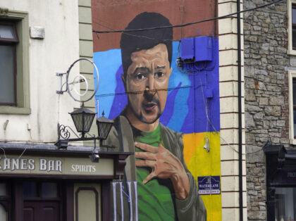 People pass a mural of President of Ukraine Volodymyr Zelenskyy, by the artist Phil Atkinson in Granard, County Longford, Ireland. Picture date: Tuesday April 5, 2022. (Photo by Niall Carson/PA Images via Getty Images)