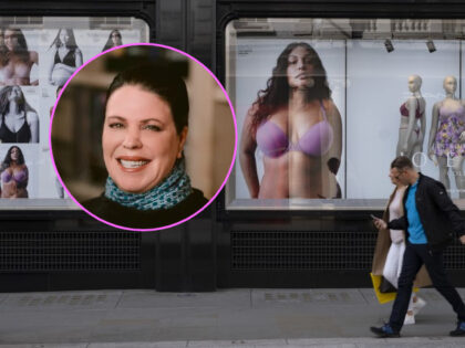 (INSET: Amy Hauk) Passers by interact with advertising photographs featuring models of all