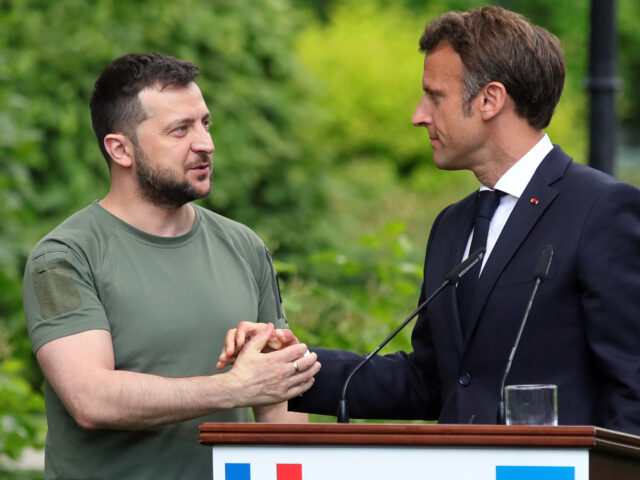 KYIV, UKRAINE - JUNE 16, 2022 - President of Ukraine Volodymyr Zelenskyy (L) shakes hands with President of the French Republic Emmanuel Macron during a joint press conference, Kyiv, capital of Ukraine. This photo cannot be distributed in the Russian Federation. (Photo credit should read Pavlo Bagmut/Ukrinform/Future Publishing via Getty …