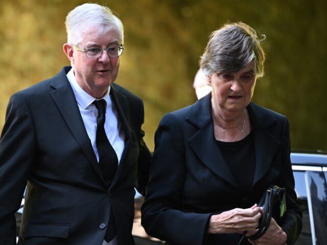 CARDIFF, WALES - SEPTEMBER 16: Mark Drakeford, First Minister of Wales and his wife, Clare Drakeford attend a Service of Prayer and Reflection for the Life of The Queen at Llandaff Cathedral on September 16, 2022 in Cardiff, Wales. King Charles III is visiting Wales for the first time since …