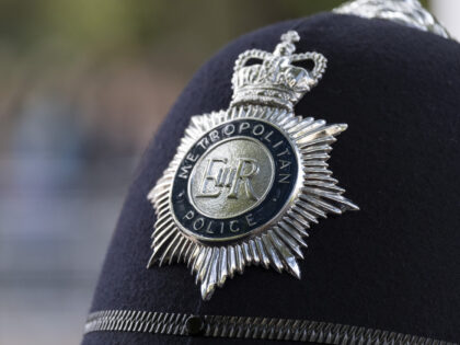 Metropolitan Police badge on a male policeman's helmet on 14th September 2022 in London, United Kingdom. The Metropolitan Police Service, formerly and still commonly known as the Metropolitan Police, is the territorial police force responsible for the prevention of crime and law enforcement in Greater London. The Met was recently …