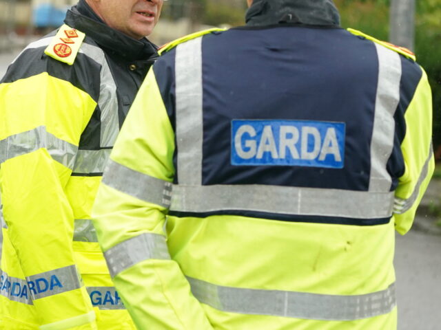 Garda Commissioner Drew Harris (left) at the scene of an explosion at Applegreen service s