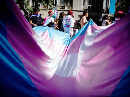 BUENOS AIRES, ARGENTINA - 2022/11/05: Participants march with a large banner during the annual Pride Parade. Demonstrators marched from Plaza de Mayo square to the National Congress building during the 31st annual LGBTQ Pride Parade in Buenos Aires. (Photo by Mariana Nedelcu/SOPA Images/LightRocket via Getty Images)