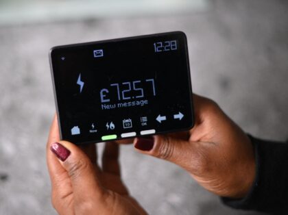 Samantha Pierre-Joseph shows her smart meter indicating her remaining credit balance, in p