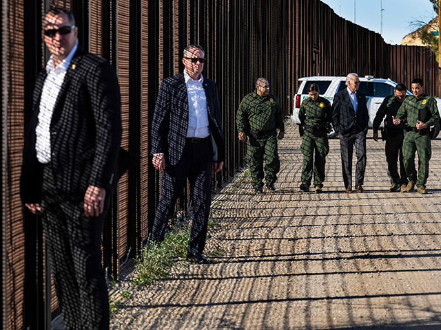 President Joe Biden speaks with US Customs and Border Protection officers as he visits the