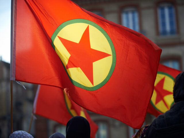 A kurdish flag during the march. The Toulouse's Kurdish community gathered to pay tri