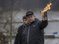 STOCKHOLM, SWEDEN - JANUARY 21: Rasmus Paludan burns the Koran outside of the Turkish embassy on January 21, 2023 in Stockholm, Sweden. Swedish authorities granted permission to a series of protests for and against Turkey amid the bid to join NATO, with far-right Danish-Swedish politician Rasmus Paludan - a controversial …
