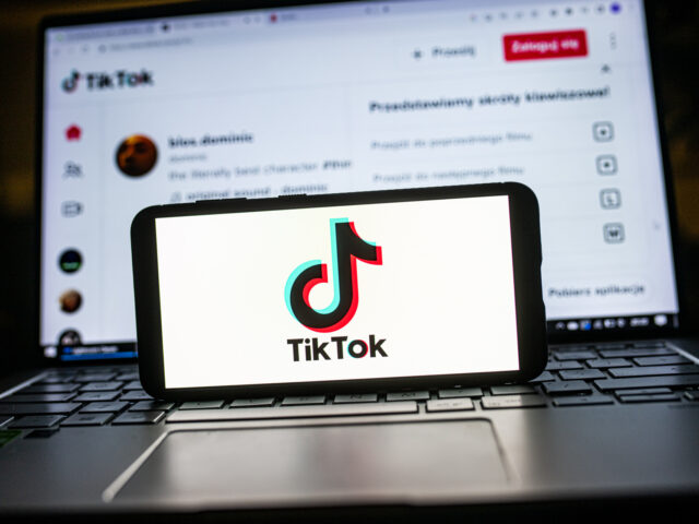 POLAND - 2023/01/20: In this photo illustration a TikTok logo seen displayed on a smartphone. (Photo Illustration by Mateusz Slodkowski/SOPA Images/LightRocket via Getty Images)