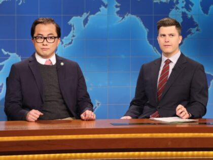 SATURDAY NIGHT LIVE -- Aubrey Plaza, Sam Smith Episode 1836 -- Pictured: (l-r) Bowen Yang as Rep. George Santos and anchor Colin Jost during Weekend Update on Saturday, January 21, 2023 -- (Photo by: Will Heath/NBC via Getty Images)