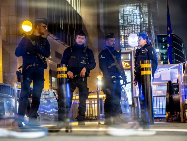 Police officers hold a security perimeter around the site of a knife attack, at the Schuman metro station, in Brussels, Monday 30 January 2023. Several people were allegeldy injured, police have arrested the attacker. BELGA PHOTO HATIM KAGHAT (Photo by HATIM KAGHAT / BELGA MAG / Belga via AFP) (Photo …
