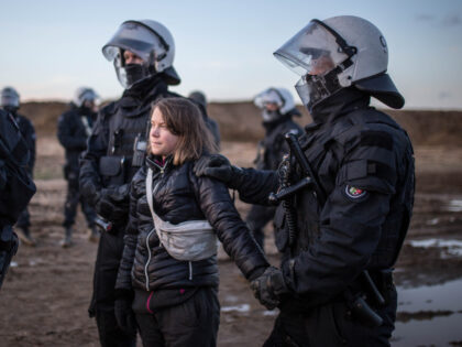 ERKELENZ, GERMANY - JANUARY 17: Police officers detain climate activist Greta Thunberg at a demonstration against the expansion of the Garzweiler coal mine near the village of Luetzerath on January 17, 2023 in Erkelenz, Germany. The demonstrators were held by police for hours before they had to go through identity …