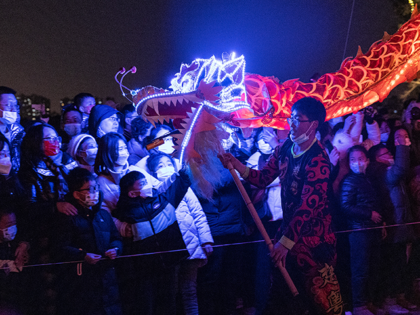Members of a traditional dragon dance troupe perform during Spring Festival celebrations a