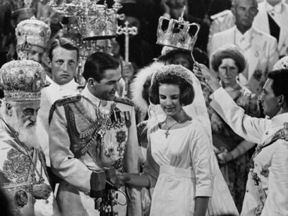 21st September 1964: King Constantine of Greece and Princess Anne-Marie of Denmark during their wedding in Athens Cathedral. The service was conducted by Archbishop Chrystostomos, the Primate of the Greek Orthodox Church (left). (Photo by Central Press/Getty Images)