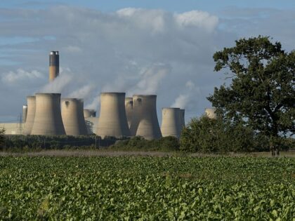 A view of the cooling towers of the Drax coal-fired power station near Selby, northern England on September 25, 2015. Energy company Drax has abandoned a 1 billion GBP installation of carbon capture technology to cut emissions, citing the UK government's reduction of subsidies for renewable energy. AFP PHOTO / …