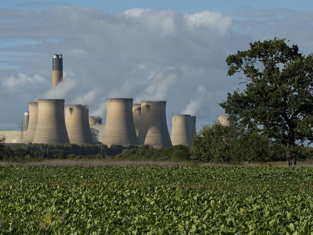 A view of the cooling towers of the Drax coal-fired power station near Selby, northern England on September 25, 2015. Energy company Drax has abandoned a 1 billion GBP installation of carbon capture technology to cut emissions, citing the UK government's reduction of subsidies for renewable energy. AFP PHOTO / …