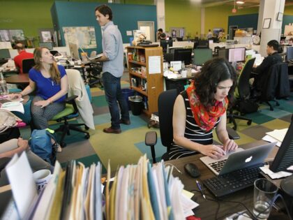SOMERVILLE, MA - MAY 25: Micaelah Morrill at Greentown Labs in Somerville, Mass., May 25, 2016. As more companies go to open office plans, workers wax nostalgic for the privacy and distraction-free zone of the much-hated cubicle. (Photo by Suzanne Kreiter/The Boston Globe via Getty Images)