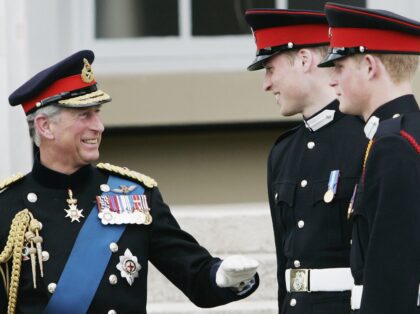 SURREY, ENGLAND - APRIL 12: Prince Harry (R) and Prince William stand on the steps of the Old College at Sandhurst Military Academy with their father Prince Charles, Prince of Wales after the Sovereign's Parade on April 12, 2006 in Surrey, England. (Photo by Tim Graham Photo Library via Getty …