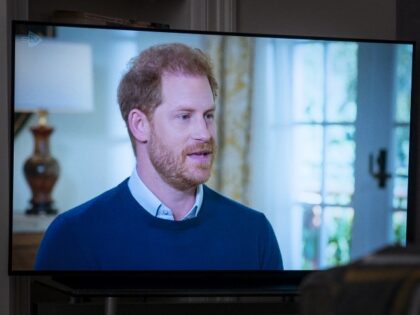 A person at home in Edinburgh watching the Duke of Sussex being interviewed by ITV's Tom Bradby during Harry: The Interview, two days before his controversial autobiography Spare is published. Picture date: Sunday January 8, 2023. (Jane Barlow/PA Images via Getty Images)