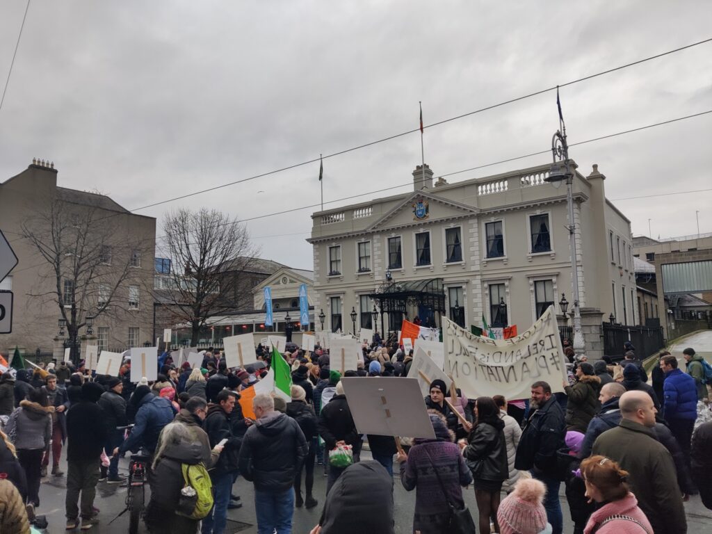 Protesters gather outside Dublin s Mansion House during an anti-immigration protest in the city. Credit: Peter Caddle