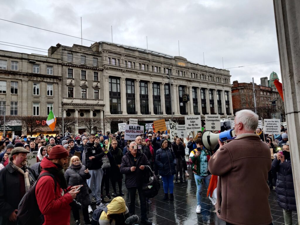 Speaker Malachy Steenson addresses the crowd during the Dublin Says No anti-immigration protest. Credit: Peter Caddle