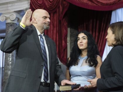 Vice President Kamala Harris, right, participates in a ceremonial swearing-in of Sen. John Fetterman, D-Pa., left, with his wife Gisele Barreto Fetterman, in the Old Senate Chamber on Capitol Hill in Washington, Tuesday, Jan. 3, 2023. (Jacquelyn Martin/AP)