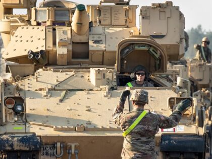 US Army's 1st Armoured Battalion of the 9th Regiment, 1st Division from Fort Hood in Texas Bradley Infantry Fighting Vehicles is unloaded as they arrive during operation Atlantic Resolve rotation at the Pabrade railway station some 50 km (31 miles) north of the capital Vilnius, Lithuania, Monday, Oct. 21, 2019. …