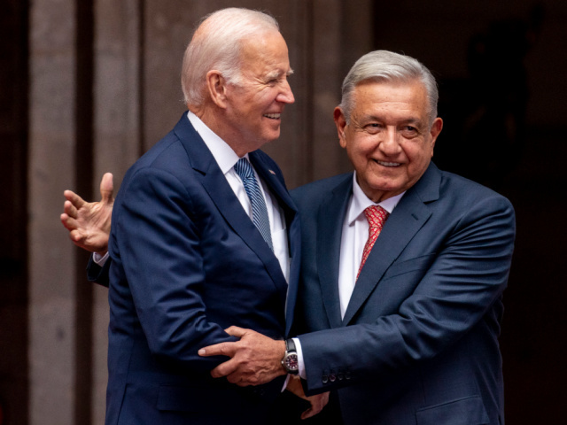 President Joe Biden is greeted by Mexican President Andres Manuel Lopez Obrador as he arrives at the National Palace in Mexico City, Mexico, Monday, Jan. 9, 2023. (AP Photo/Andrew Harnik)