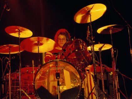 Robbie Bachman with the band Bachman Turner Overdrive on stage at the Hammersmith Apollo,