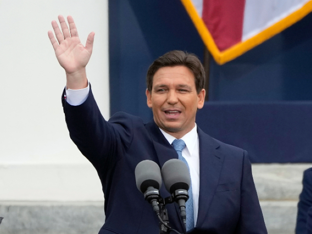 Florida Gov. Ron DeSantis waves to the crowd after being sworn in to begin his second term during an inauguration ceremony outside the Old Capitol Tuesday, Jan. 3, 2023, in Tallahassee, Fla. (AP Photo/Lynne Sladky)