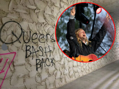 Christian musician Sean Feucht, of California, sings to the crowd during a rally at the Na