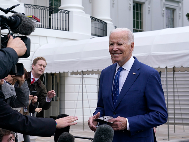President Joe Biden talks with reporters outside of the White House in Washington, Wednesd