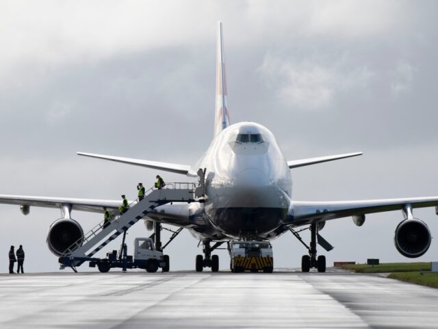 ST. ATHAN, WALES - OCTOBER 8: British Airways crew depart a Boeing 747-400 (G-CIVY) aircraft for the last time after it arrives at St. Athan airport on October 8, 2020 in St. Athan, Wales. The aircraft has clocked-up 45 million air miles having first flown in September 1998. Two Heathrow-based …