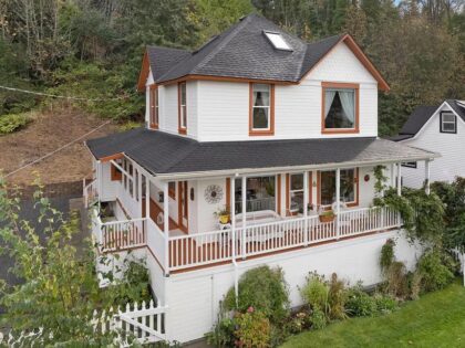 In this undated photo provided by RETO Media is the house featured in the Steven Spielberg film "The Goonies" in Astoria, Ore. The Victorian home, built in 1896 with sweeping views of the Columbia River as it flows into the Pacific Ocean, is now for sale has been listed with …