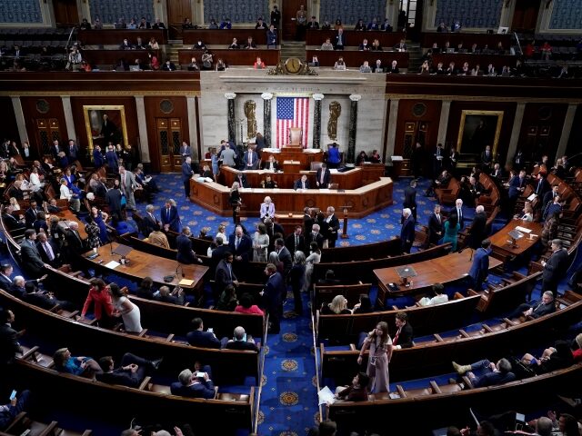 Washington , D.C. - January 3: Members talk on the floor of the House Chamber on the openi