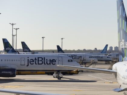 JetBlue planes at John F. Kennedy International Airport (JFK) in New York, U.S., on Wednesday, Nov. 24, 2021. Air traffic for the Thanksgiving holiday is expected to approach pre-pandemic levels and travelers are likely considering their plans with some dread, given fresh memories about thousands of canceled flights. Photographer: Angus …