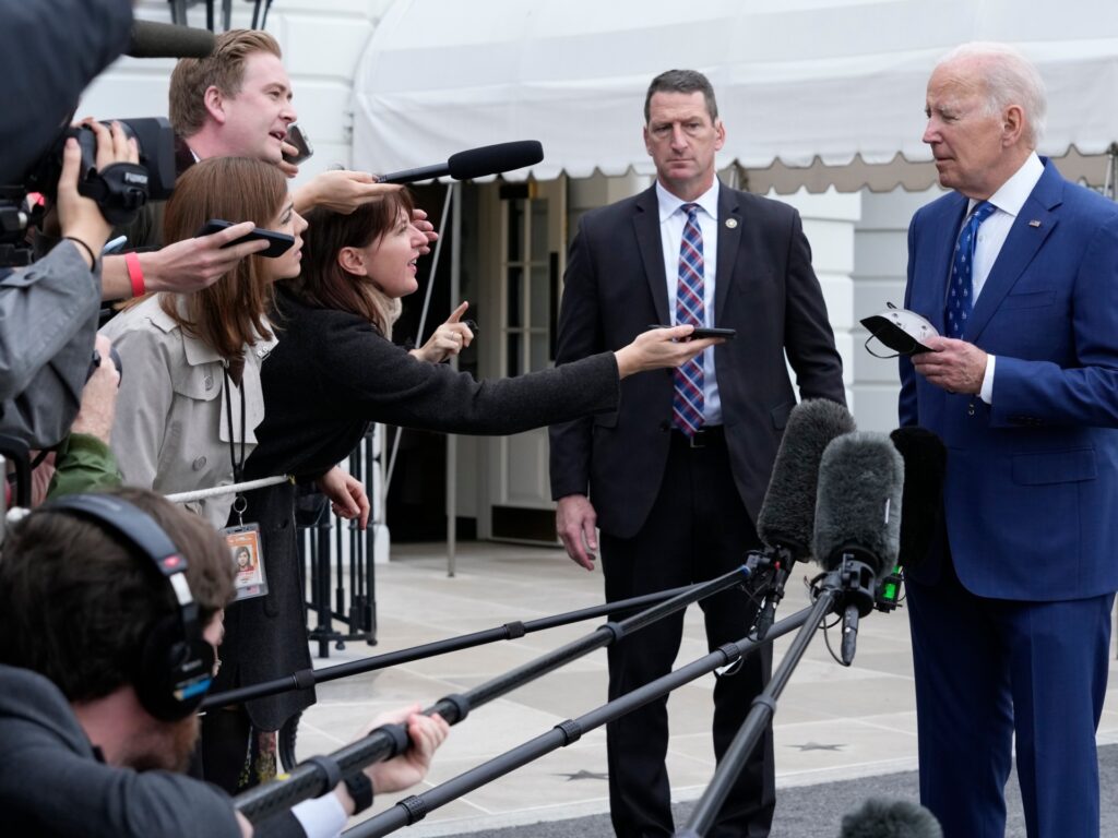 President Joe Biden talks with reporters outside of the White House in Washington, Wednesday, Jan. 4, 2023, before boarding Marine One on the South Lawn. Biden is heading to Kentucky to visit a notoriously dilapidated bridge connecting Ohio and Kentucky to promote his administration's infrastructure law. (AP Photo/Susan Walsh)