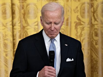 US President Joe Biden listens to a question during an event with a bipartisan group of ma
