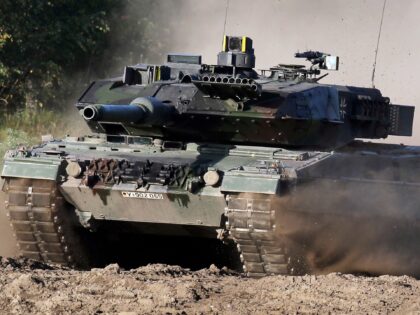 FILE --A Leopard 2 tank is pictured during a demonstration event held for the media by the German Bundeswehr in Munster near Hannover, Germany, Wednesday, Sept. 28, 2011. Poland will apply to the German government for permission to supply the German-made Leopard battle tanks to Ukraine. (AP Photo/Michael Sohn, File)