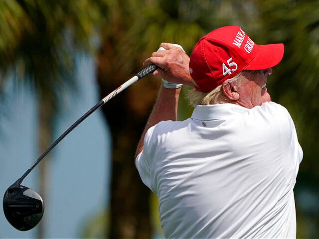 Former President Donald Trump tees off during the ProAm of the LIV Golf Team Championship at Trump National Doral Golf Club, Thursday, Oct. 27, 2022, in Doral, Fla. (AP Photo/Lynne Sladky)