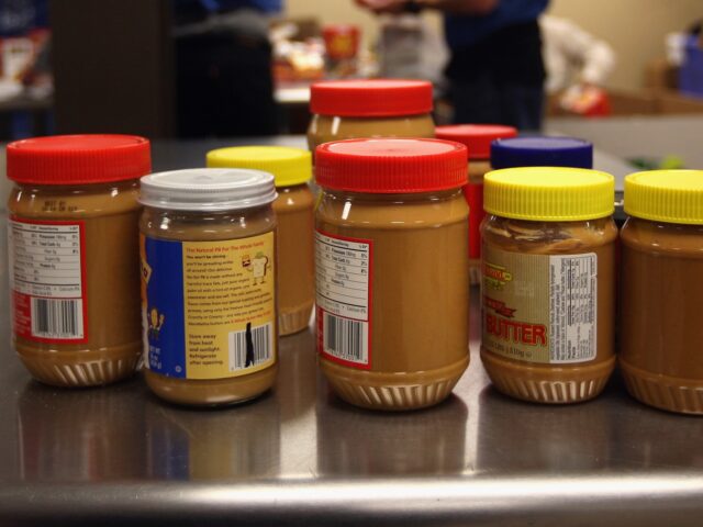 COLORADO SPRINGS, CO - FEBRUARY 24: Donated peanut butter is set aside to be crosschecked