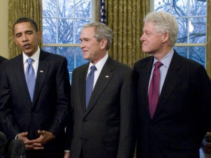 FILE: U.S. President George W. Bush, center, meets with U.S. President-elect Barack Obama, second from left, and former U.S. Presidents George H.W. Bush, far left, Bill Clinton, second right, and Jimmy Carter in the Oval Office of the White House in Washington, D.C., U.S., on Wednesday, Jan. 7, 2009. George …