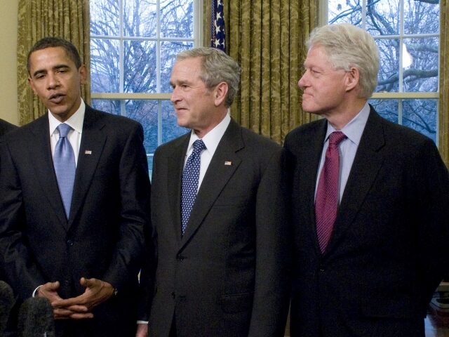 FILE: U.S. President George W. Bush, center, meets with U.S. President-elect Barack Obama,