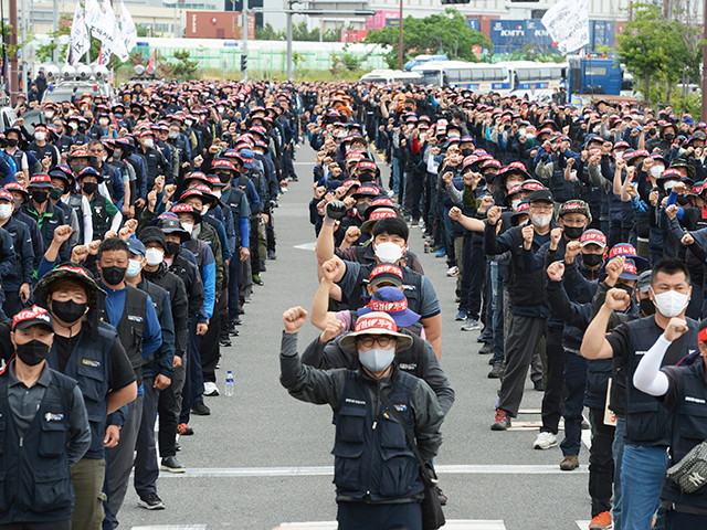 Members of the Cargo Truckers Solidarity stage a rally in Ulsan, South Korea, Monday, June