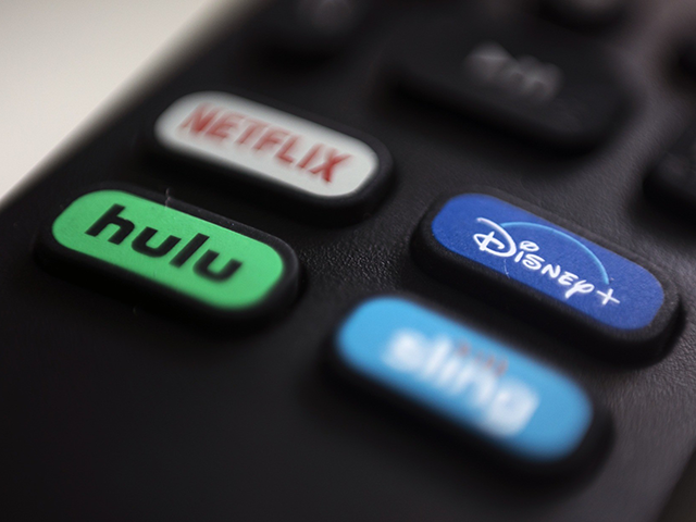 In this Aug. 13, 2020 file photo, the logos for Netflix, Hulu, Disney Plus and Sling TV ar