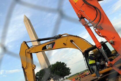 Caterpillar reported strong demand from industrial customers, but earnings fell due to cos