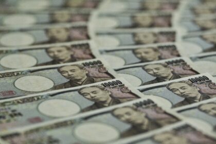 The yen sank back past 131 per dollar after the Bank of Japan left monetary policy unchang