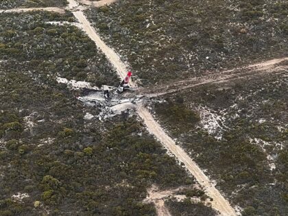 This image supplied by the Department of Fire and Emergency Services of Western Australia, shows the wreckage of a Boeing 737-3 with two people on board that went down over the Fitzgerald River National Park in Western Australia, Monday, Feb 6, 2023. The water bomber crashed in the forest between …
