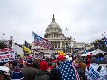 FILE - In this Jan. 6, 2021, file photo insurrections loyal to President Donald Trump rally at the U.S. Capitol in Washington. U.S. Capitol Police officers who were attacked and beaten during the Capitol riot filed a lawsuit Thursday, Aug. 26, against former President Donald Trump, his allies and members …