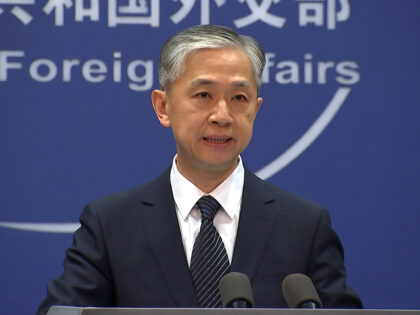 FILE - China's Foreign Ministry spokesperson Wang Wenbin speaks during the daily briefing in Beijing, June 11, 2021. China says it will sanction Raytheon Technologies and Lockheed Martin, two U.S. defense contractors who previously faced sanctions, over arms sales to Taiwan. Foreign Ministry spokesman Wang announced the sanctions at a …
